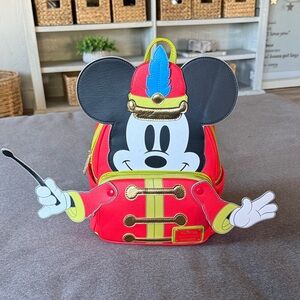 Loungefly Mickey as the Conductor. Super cute!! Excellent Condition! DISNEY